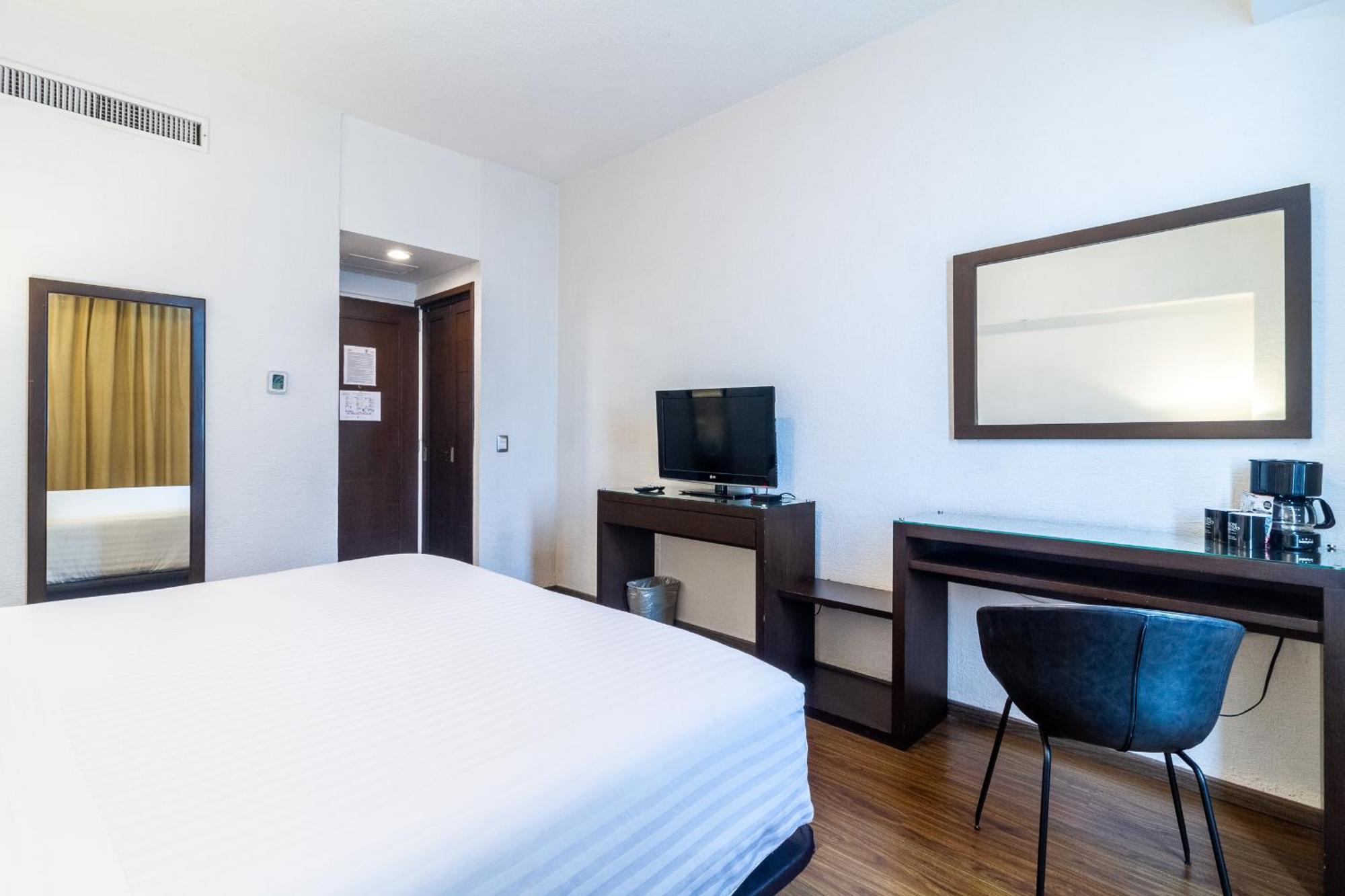 Meson Ejecutivo Guadalajara Minerva - Av Mexico Hotell Eksteriør bilde